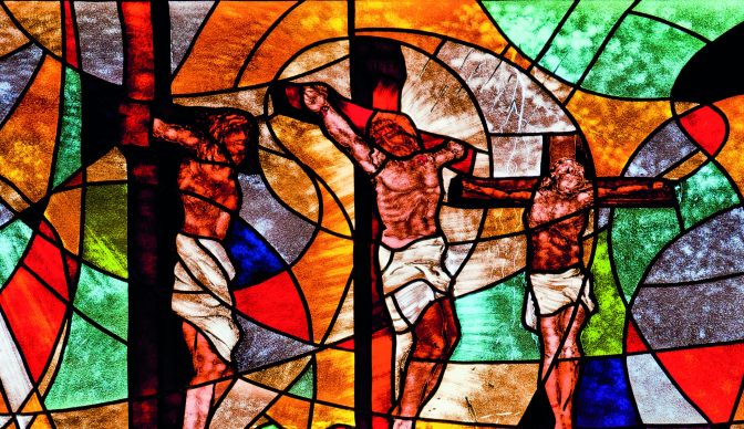 Stained glass showing Jesus crucified